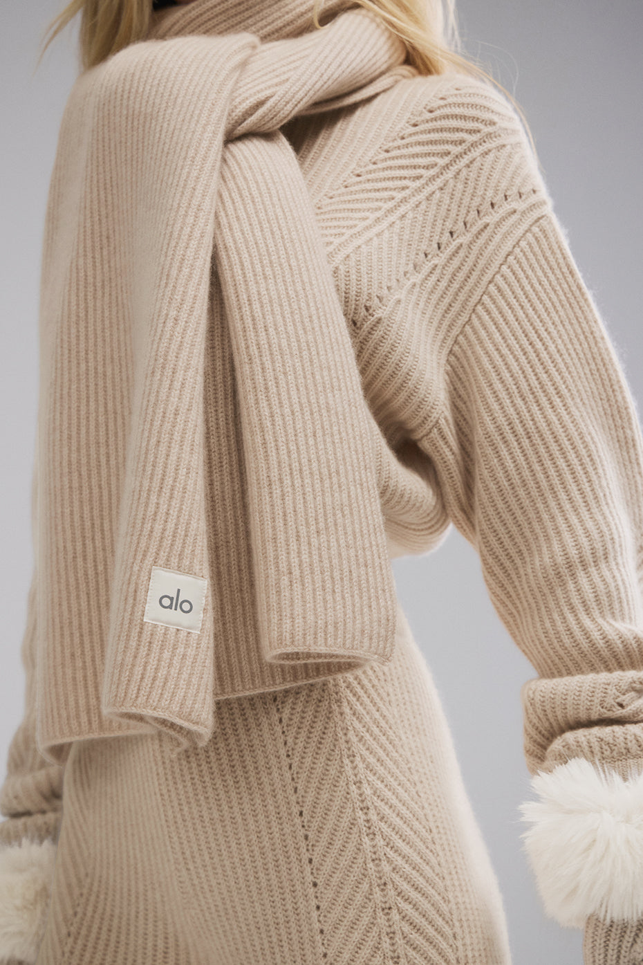 Birch Heather cashmere scarf styled as a wrap for an evening dinner.