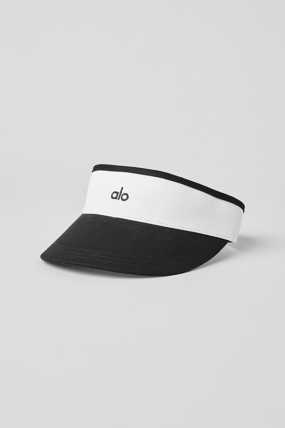 Close-up of automatic sun visor paired with activewear ponytail