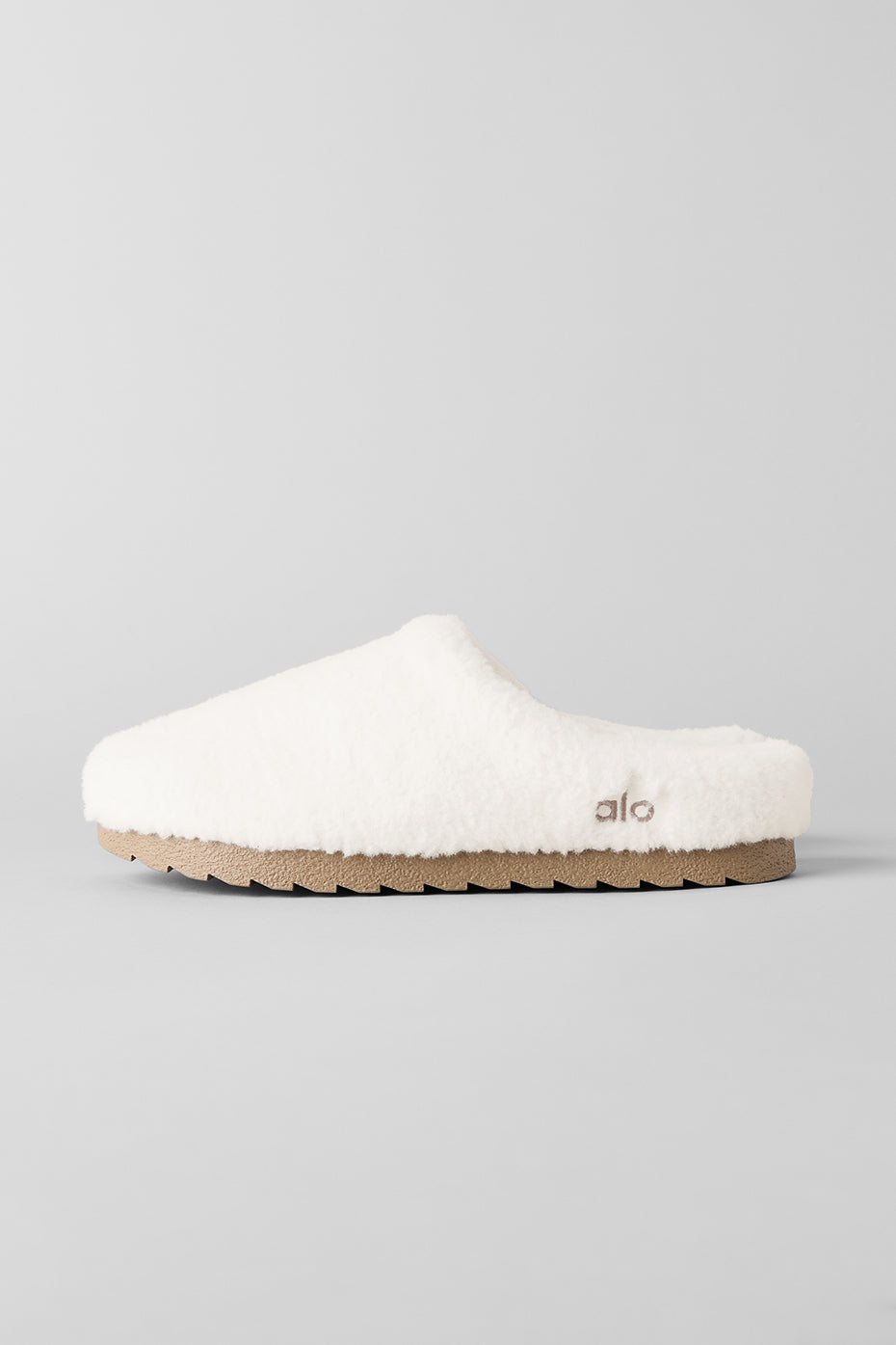 Side view of mens orthopedic slippers worn after workout