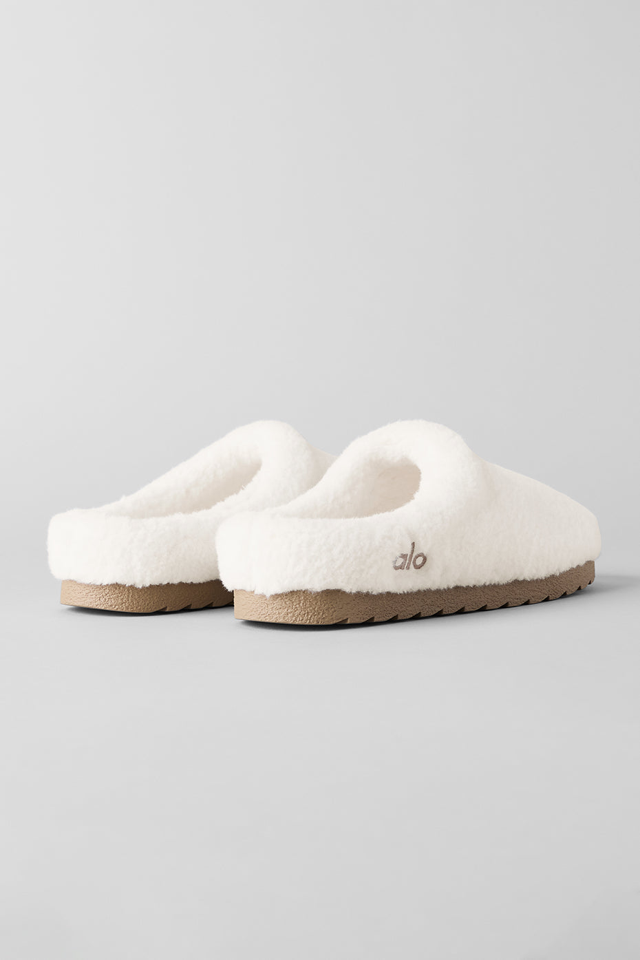 Side view of mens orthopedic slippers worn after workout