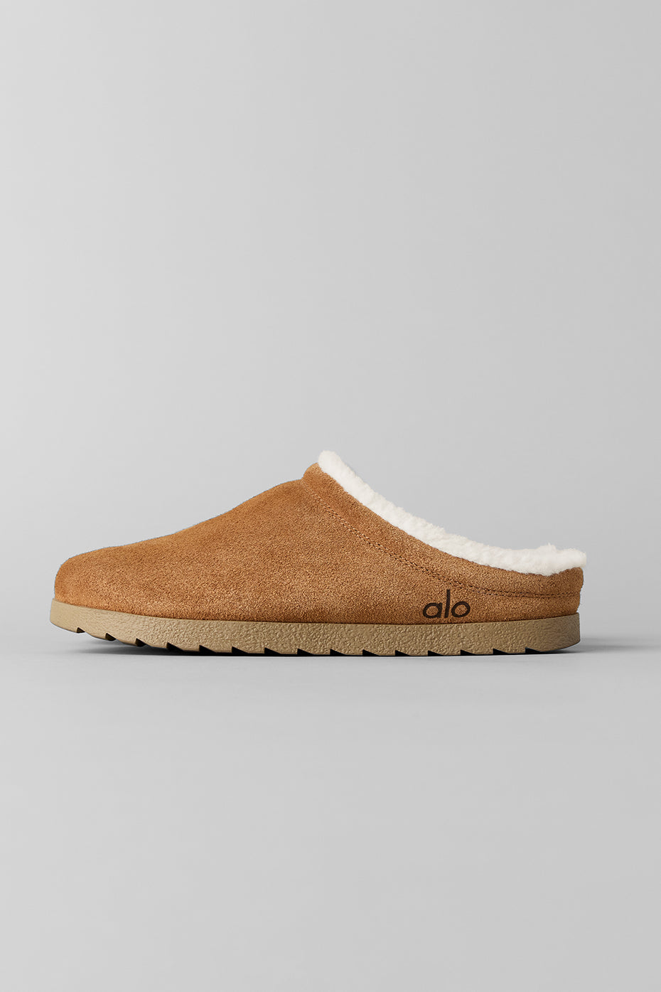 Close-up of memory foam recovery slippers highlighting textured sole