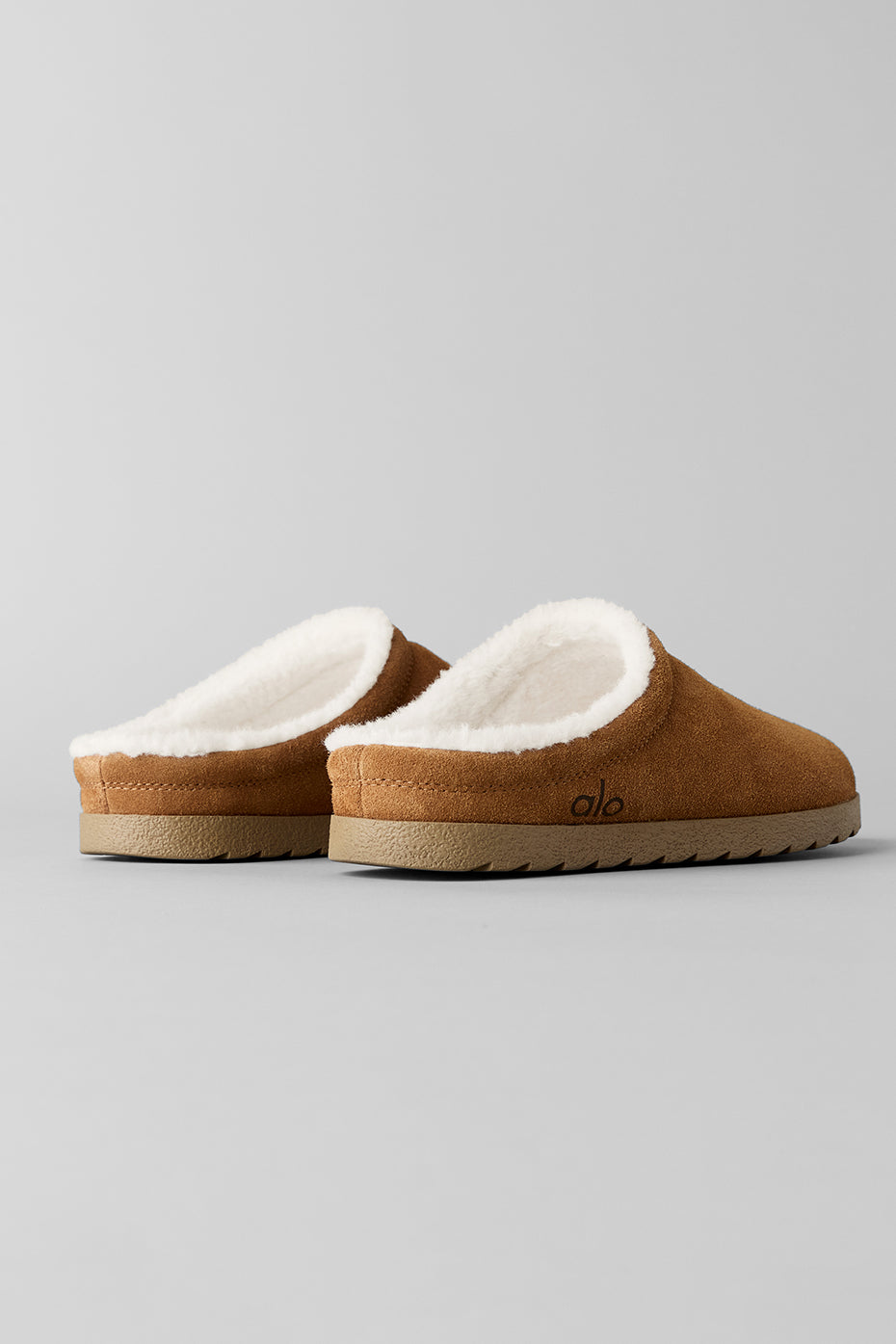 Close-up of memory foam recovery slippers highlighting textured sole