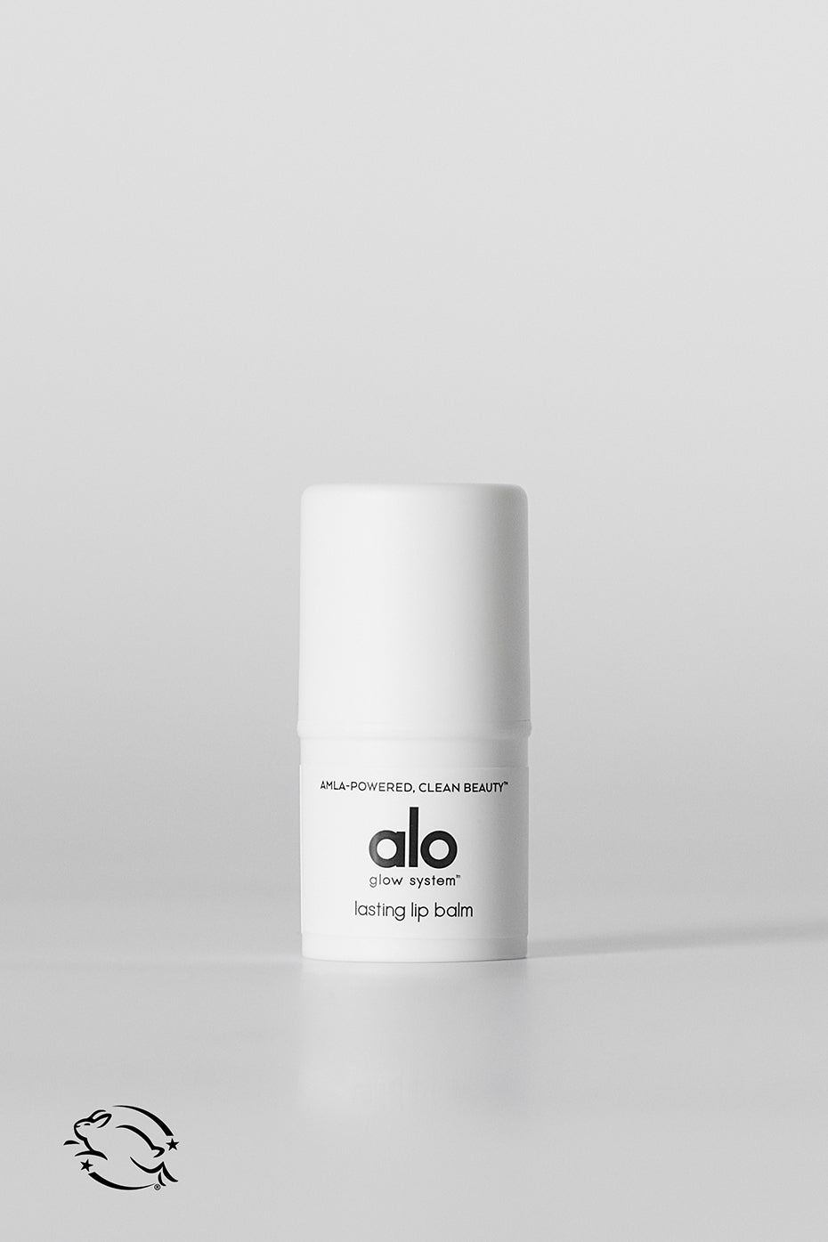 Close-up of Silky Smooth Hydrating Lip Balm on a wooden table.