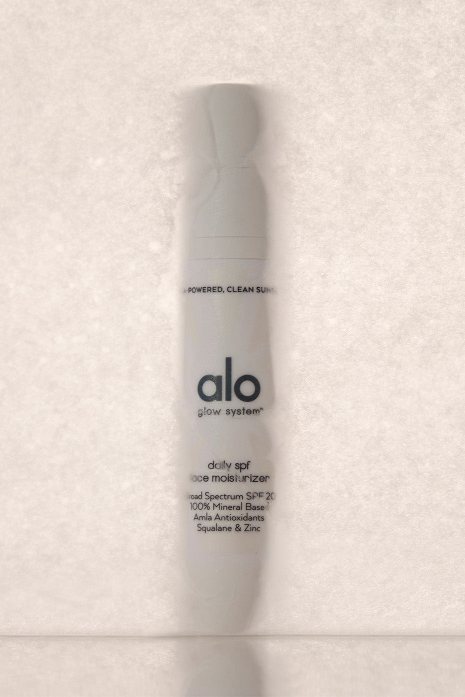 GlowGuard Daily SPF Face Moisturizer packaging on a bathroom counter.