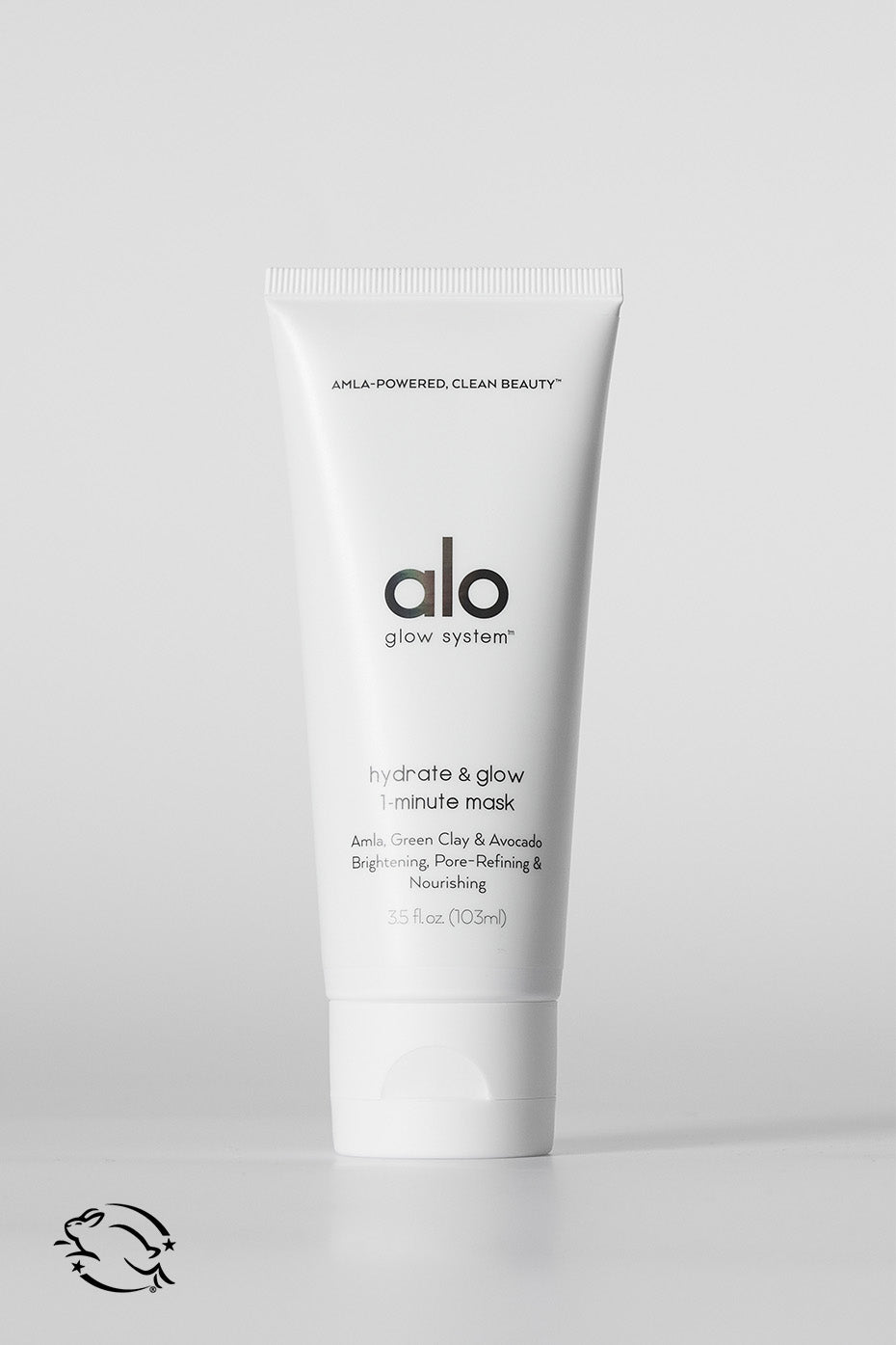 Glow & Hydrate clay mask applied on a model's face for a spa-like experience.