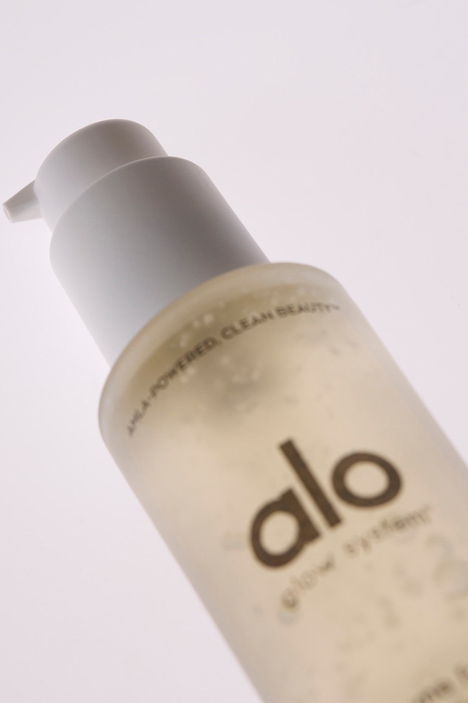Close-up of the glow oil, highlighting its rich texture.