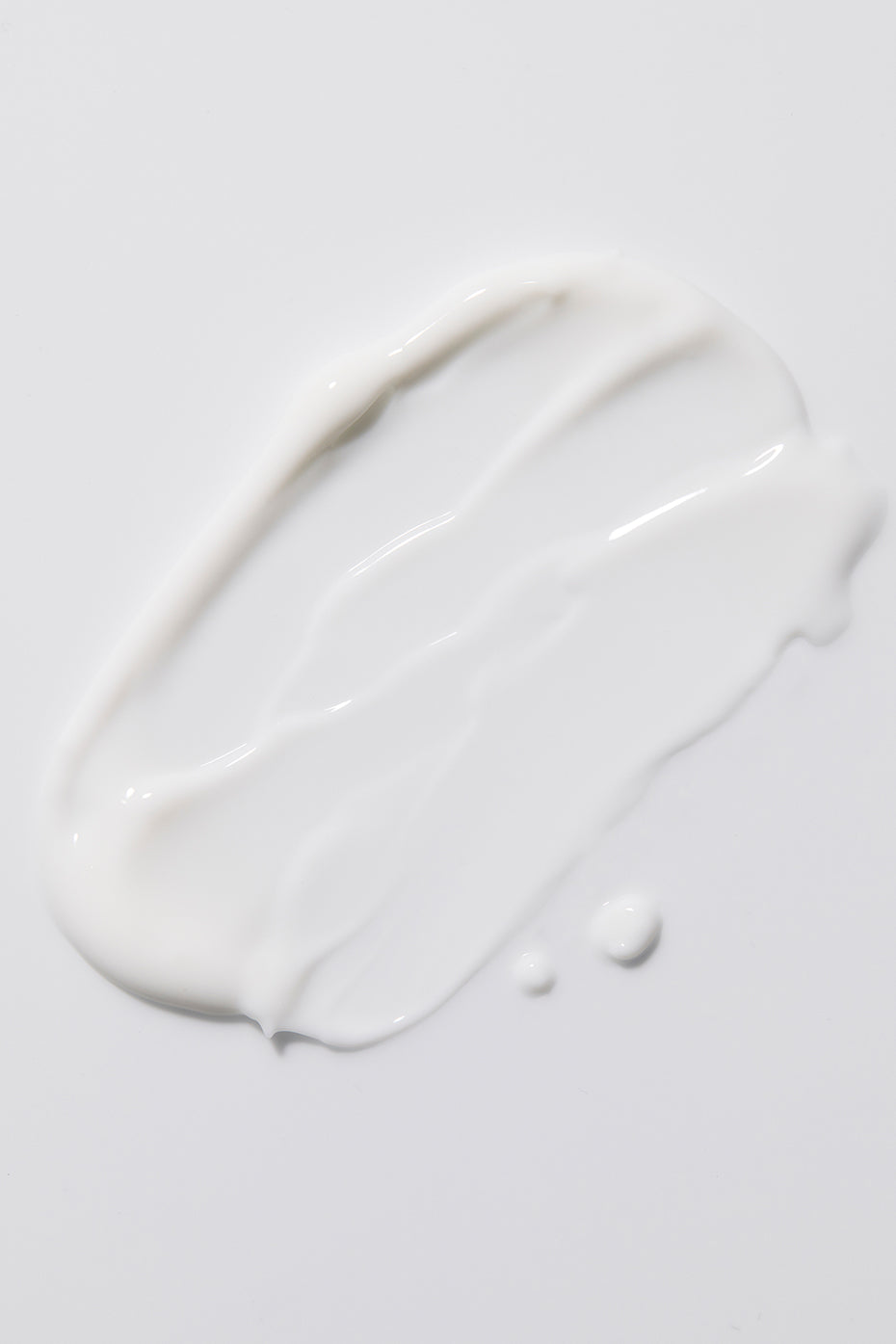 Lifestyle image of applying magnesium body lotion on hands, showcasing quick absorption.