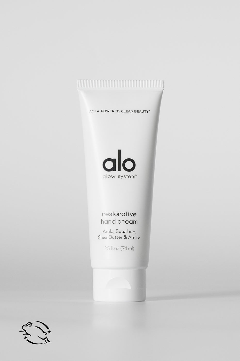 Close-up of nourishing hand cream tube against a clean background.