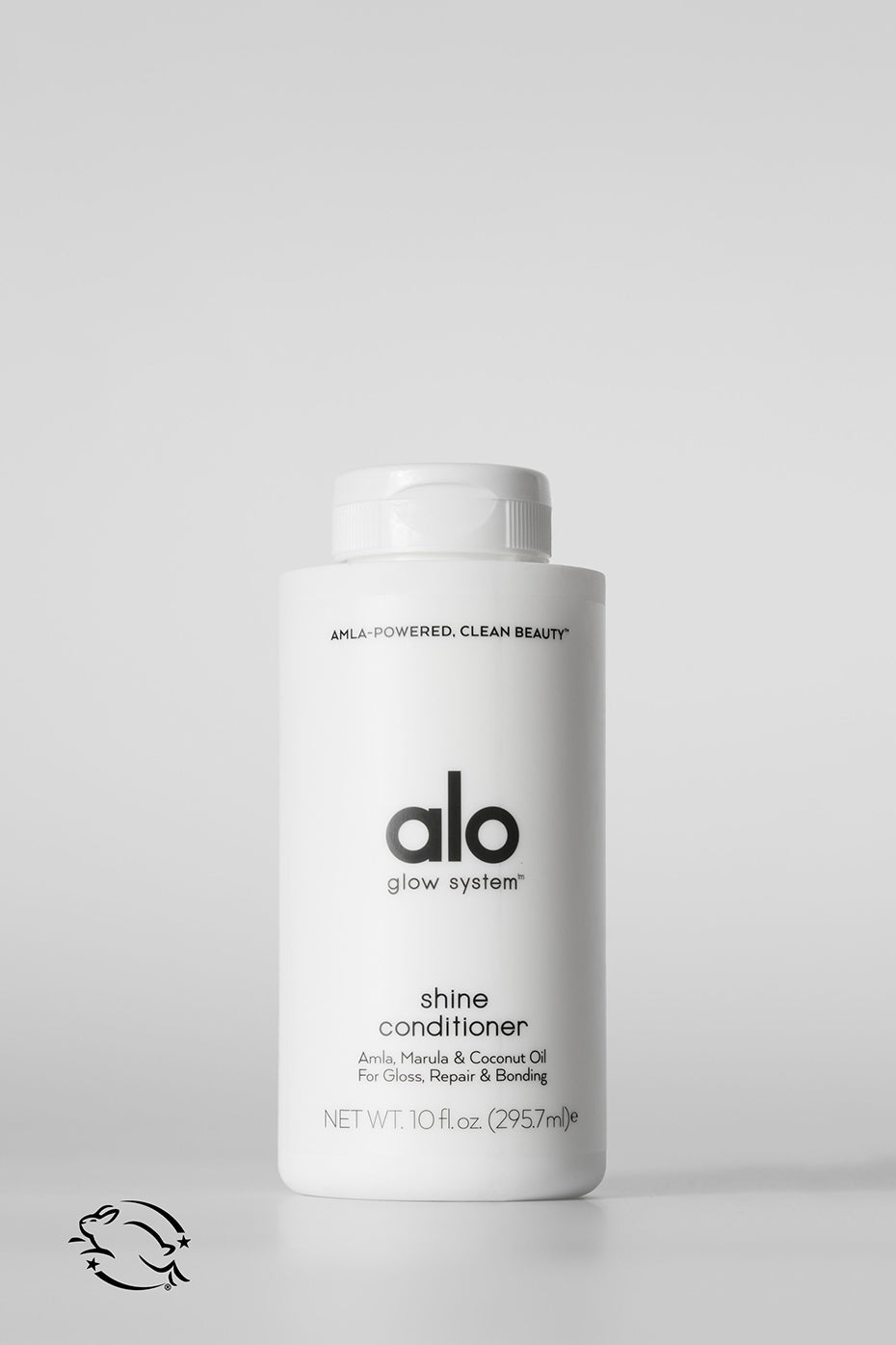 Close-up of Vibrant Shine Conditioner highlighting its smooth texture and eco-friendly label.