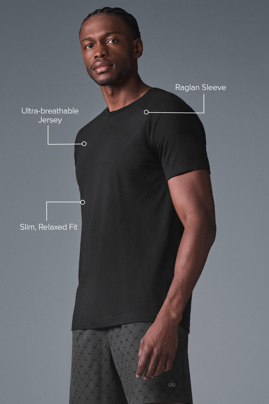 Close-up of the Triumph Black Raglan Tee, emphasizing the quality stitching and relaxed fit.