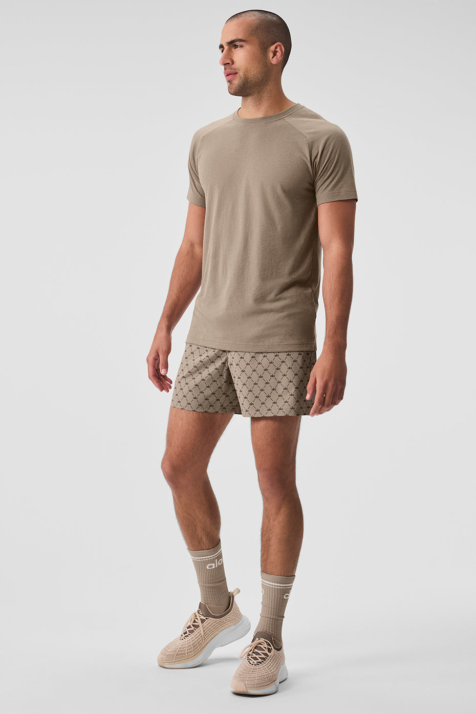 Model wearing the mens graphic t shirt for men, styled with jeans for a casual look