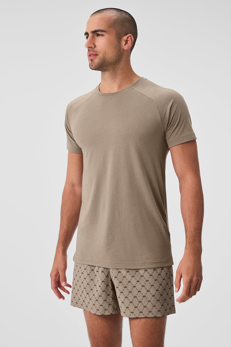 Front view of the Triumph Raglan Tee in Gravel showing the classic crew neck and sporty raglan sleeves