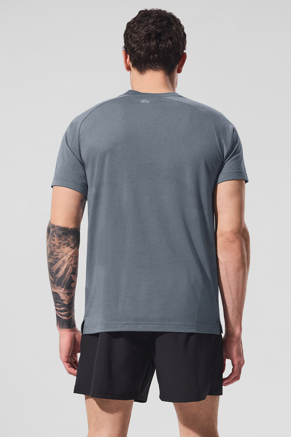 Side view of the mens t-shirt, highlighting the soft fabric and crew neck design.