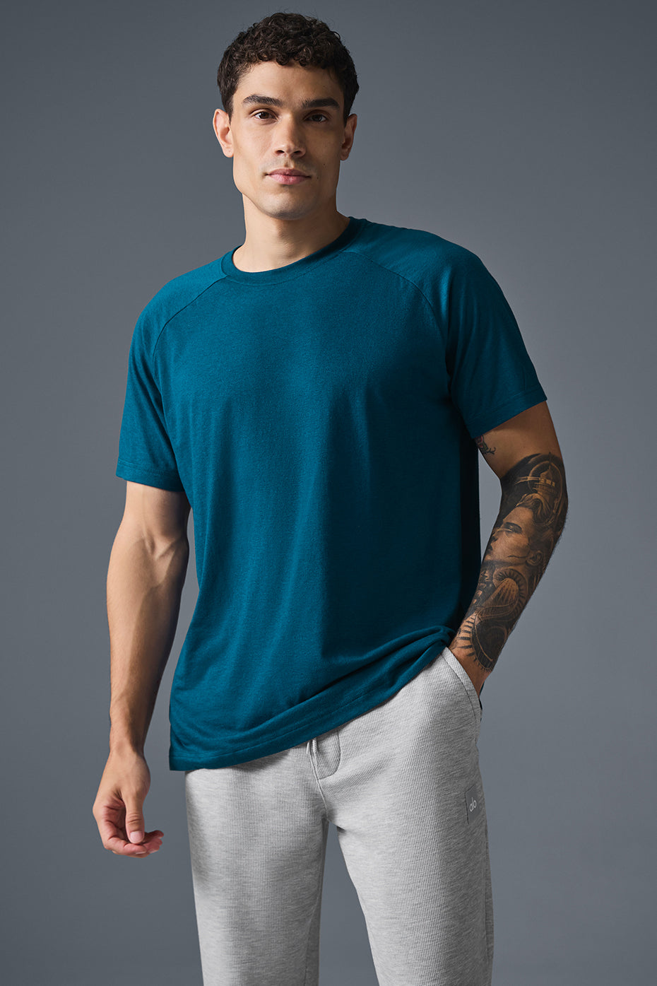 Front view of the Triumph Eclipse Crew Tee styled with comfortable work clothes