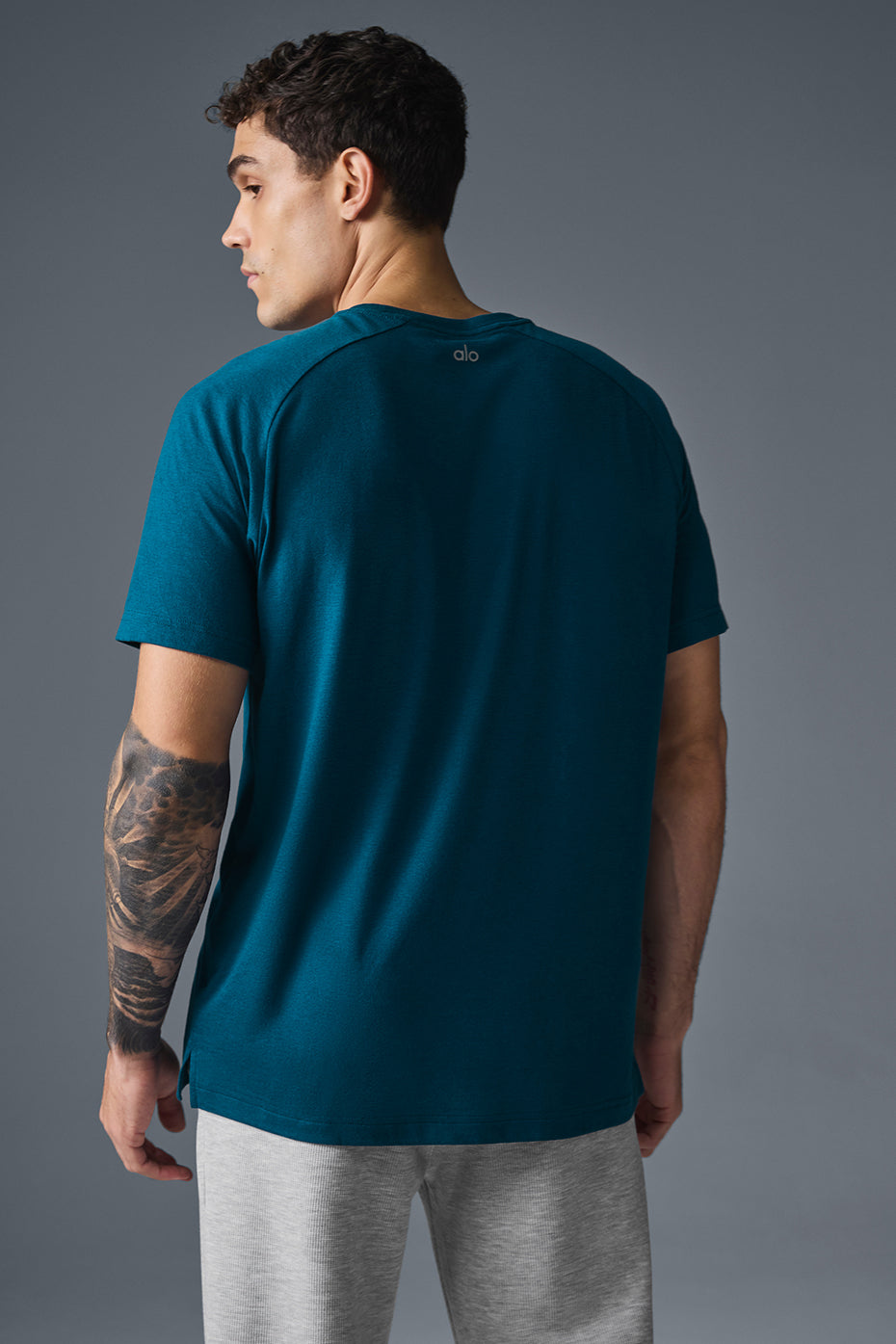Side angle showing the relaxed raglan fit of the shirt long sleeve t shirts collection