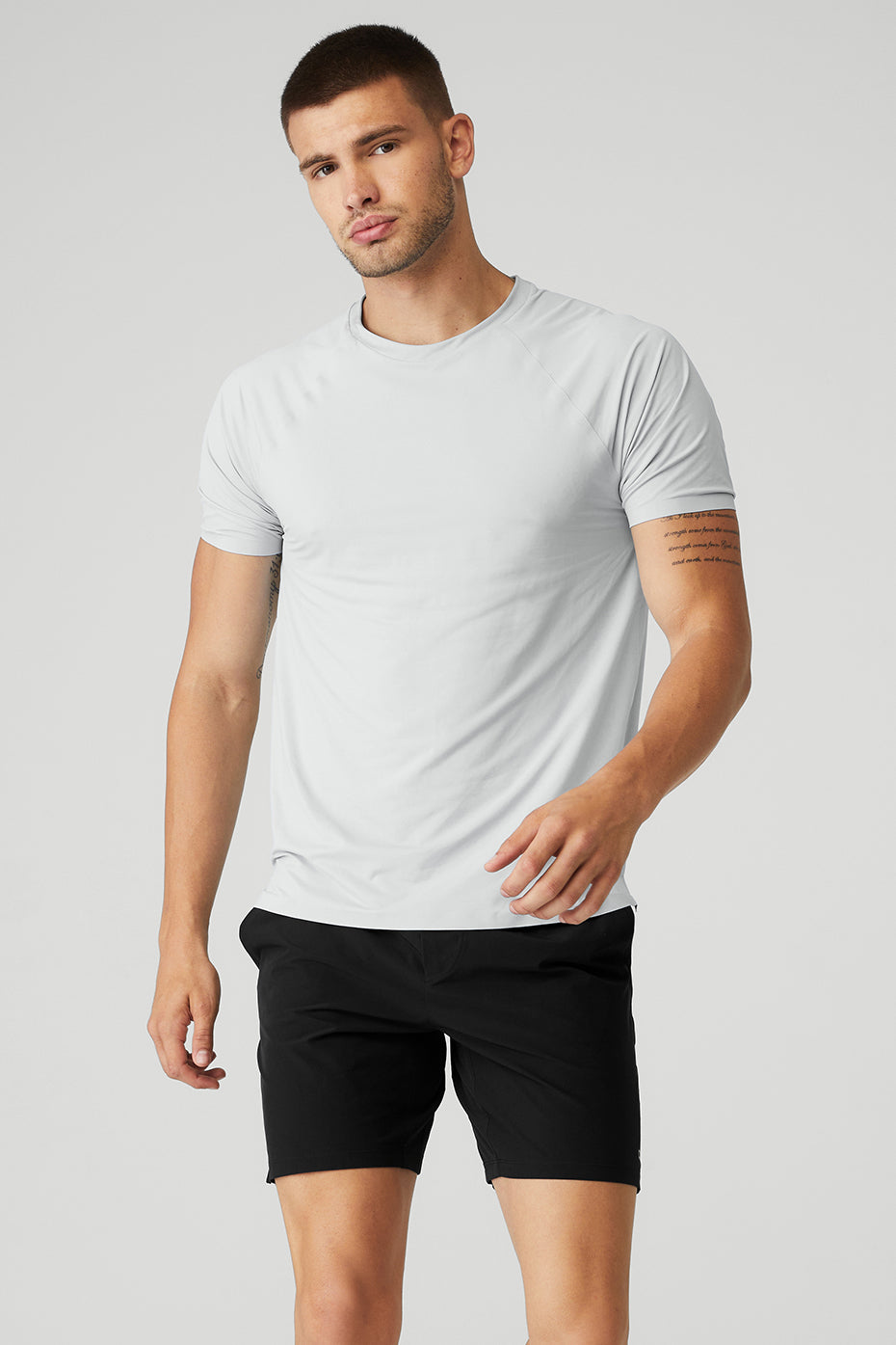 Front view of titanium performance tee worn during gym workout