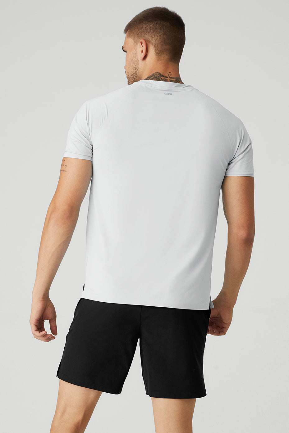Front view of titanium performance tee worn during gym workout