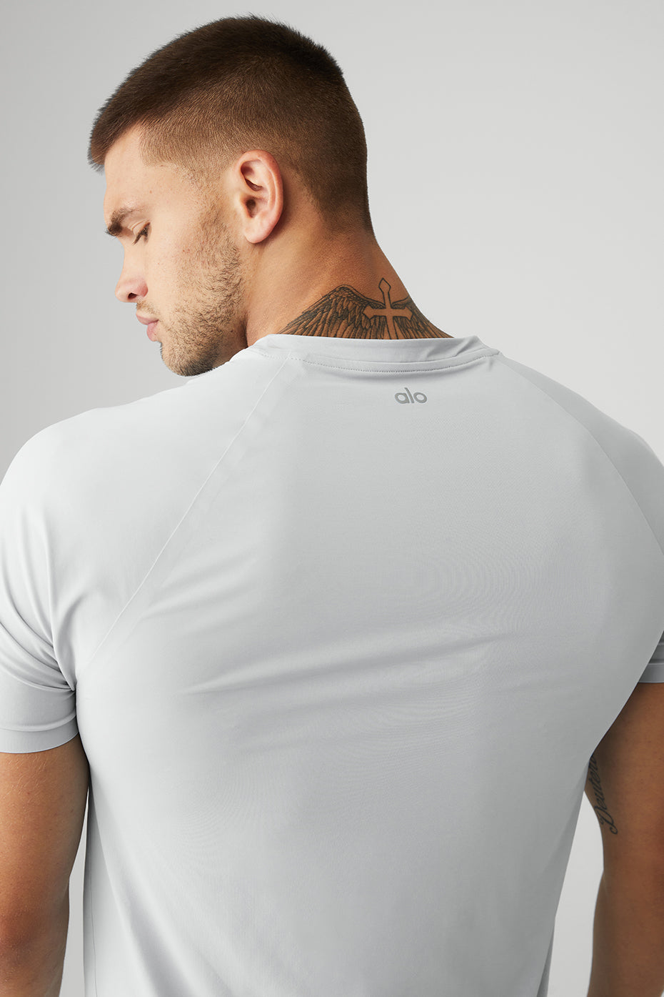 Close-up of breathable athletic top fabric texture and stitching