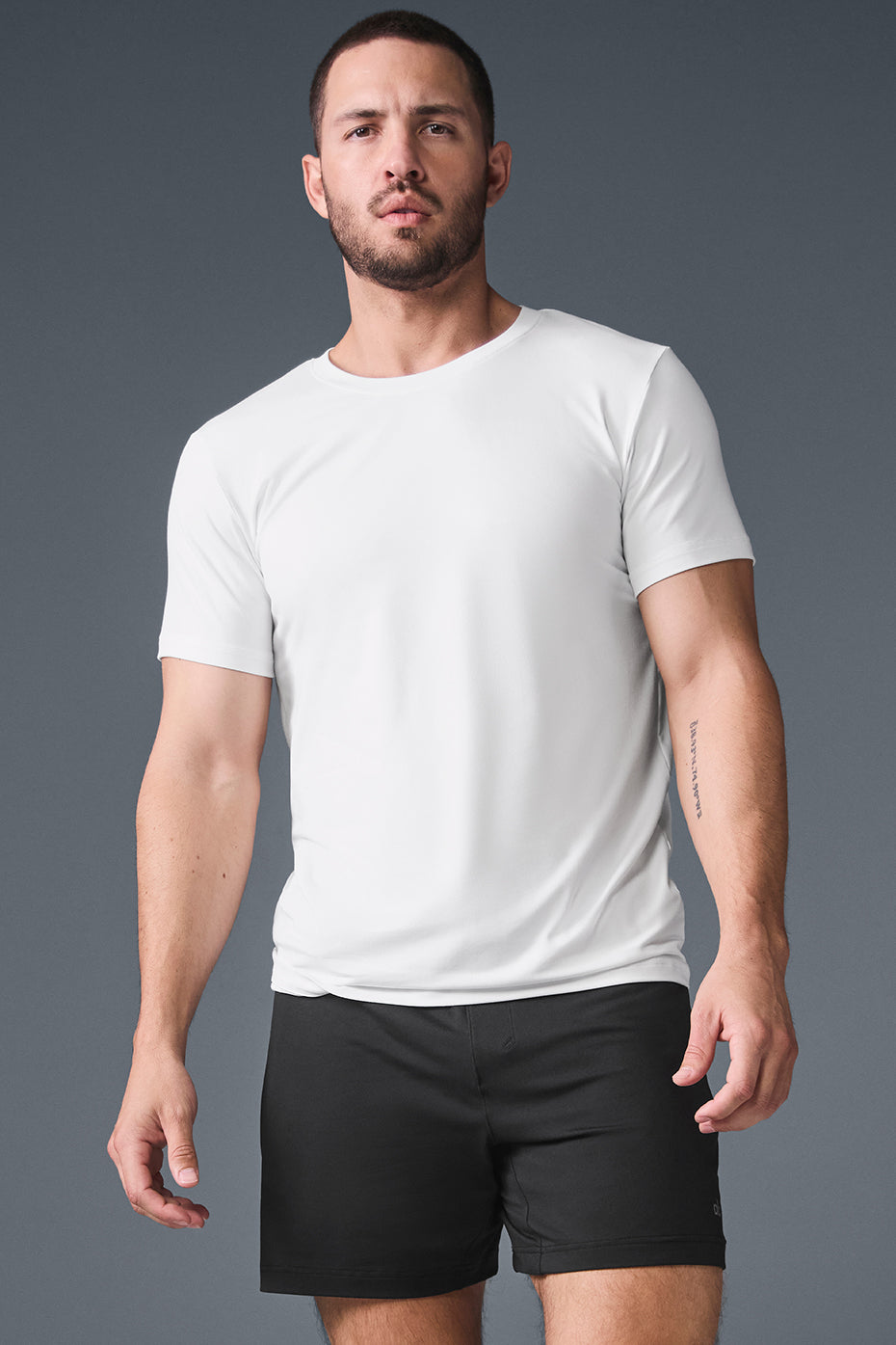 Close-up of Peter Millar performance crewneck showing neckline and stitching.