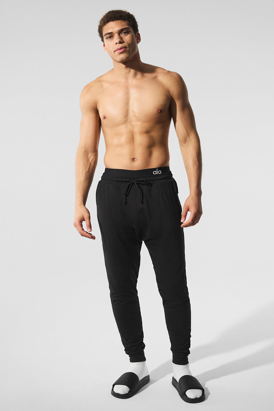 Back view of Revitalize Activewear Pants highlighting zip pockets.