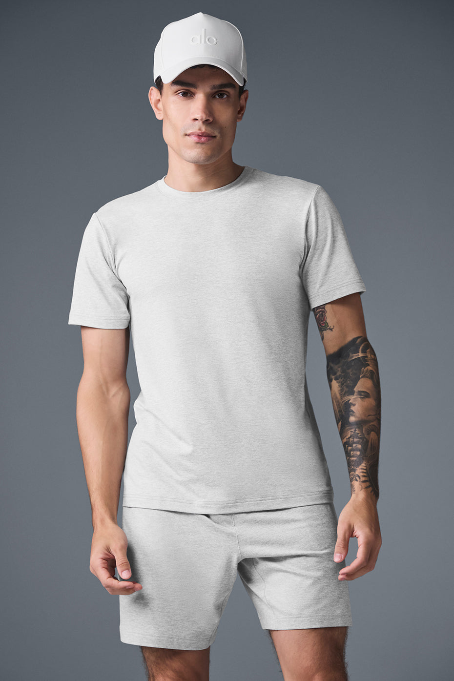 Front view of Conquer Reform Athletic Crewneck T-Shirt in Heather Grey.