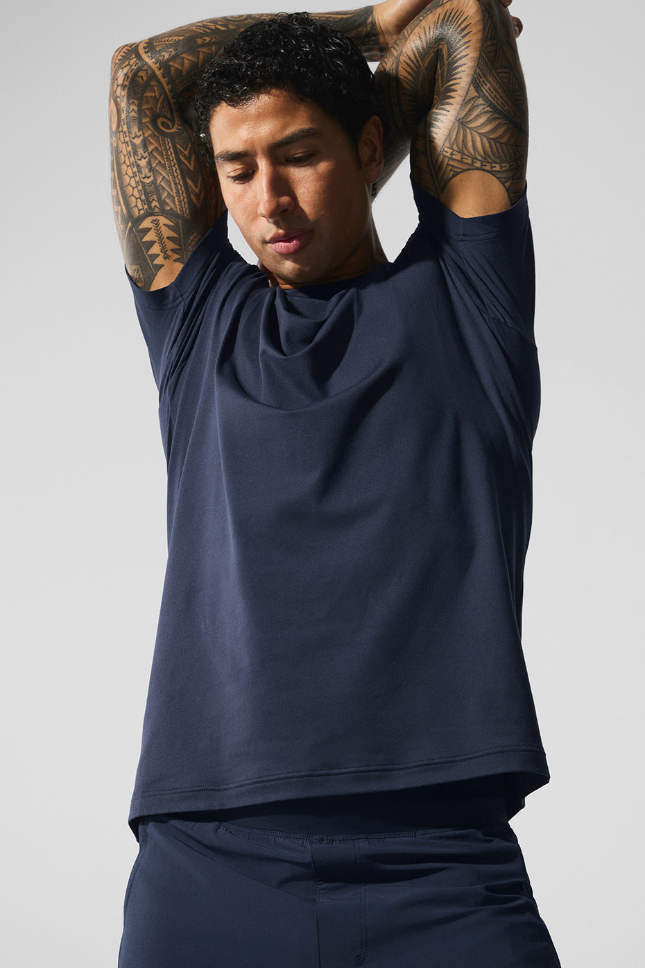 Front view of navy crewneck short sleeve t-shirt, ideal for layering.