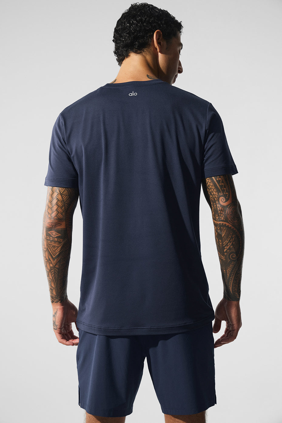 Casual look featuring navy crewneck t-shirt, perfect for everyday use.