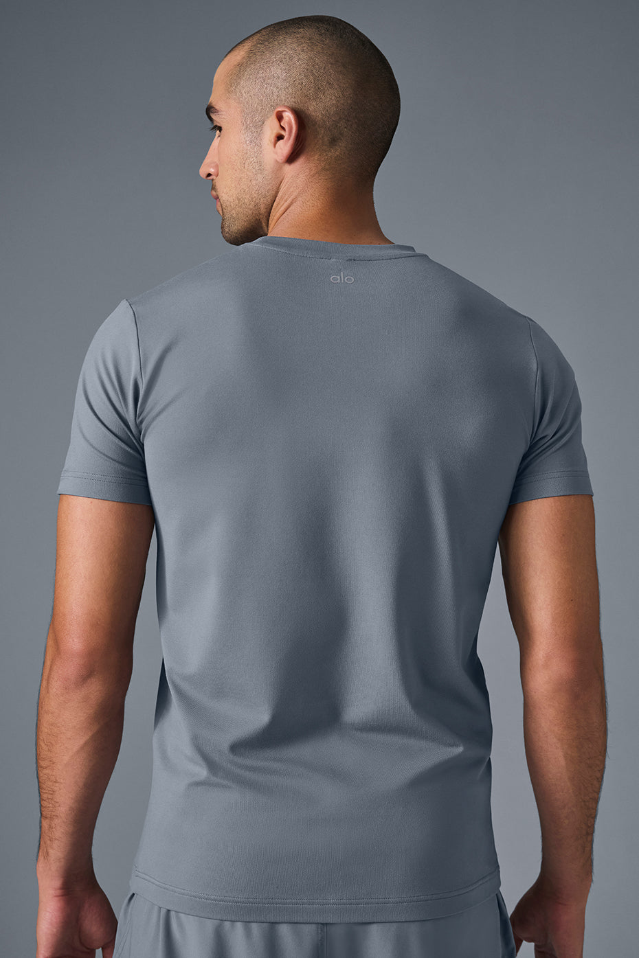 Side view showcasing the lightweight design of the crewneck sweatshirt.