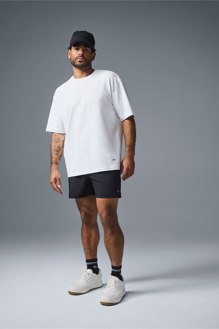Back view of the Double Take t-shirt, highlighting its modern fit and extended hem.