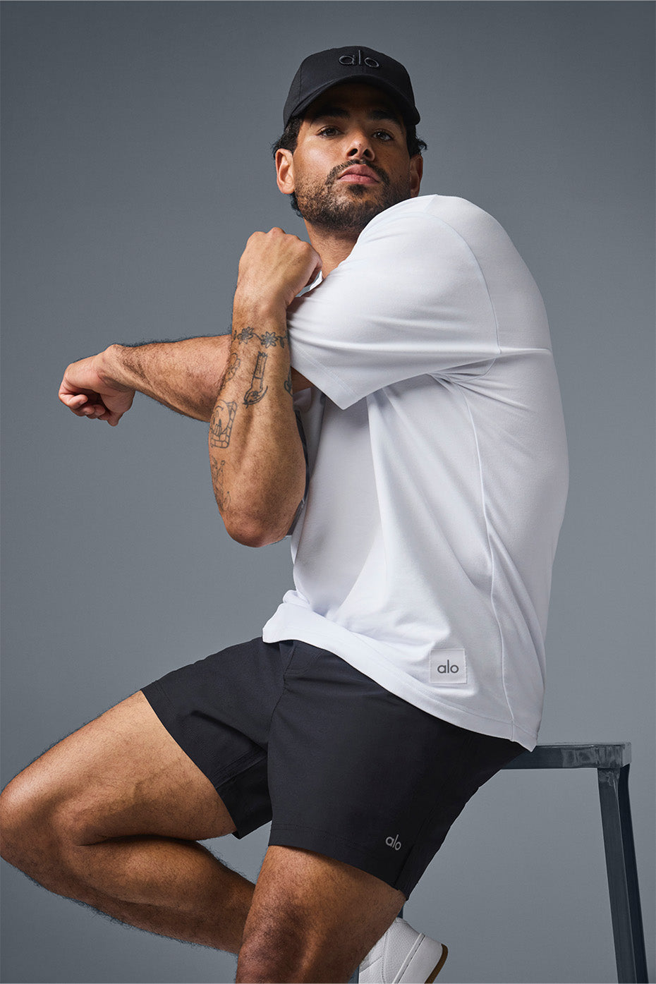 Front view of the Double Take oversized t-shirt in white, styled with baggy cargos.