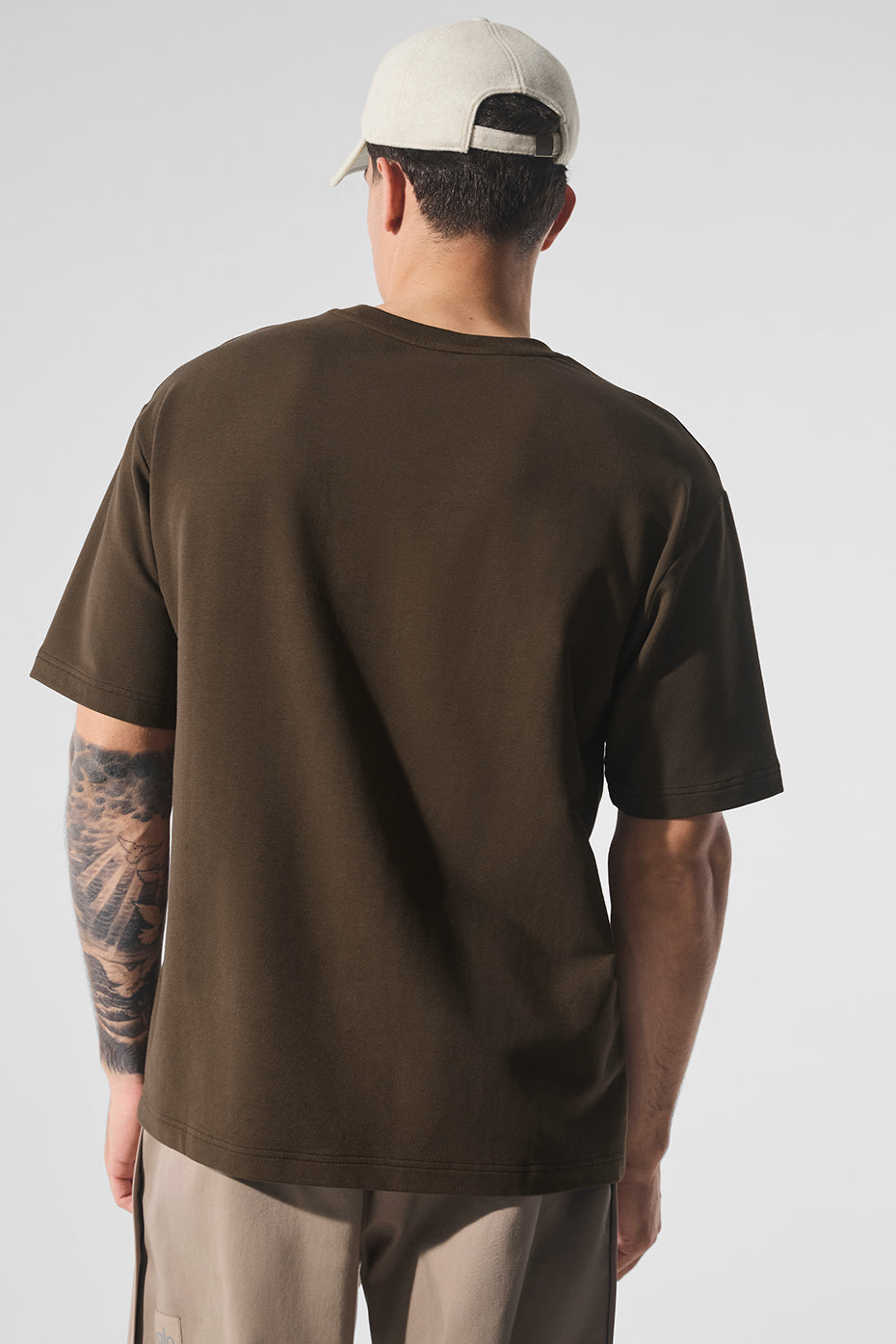 Casual outfit with Espresso oversized t-shirt and classic shorts.
