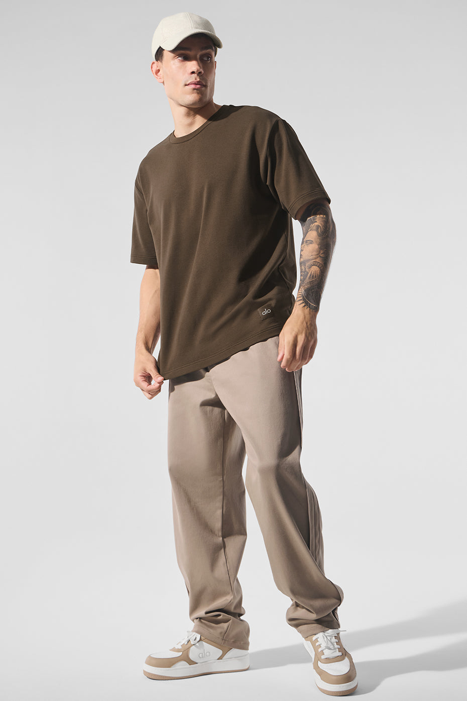 Front view of Espresso oversized t-shirt styled with cargo pants.