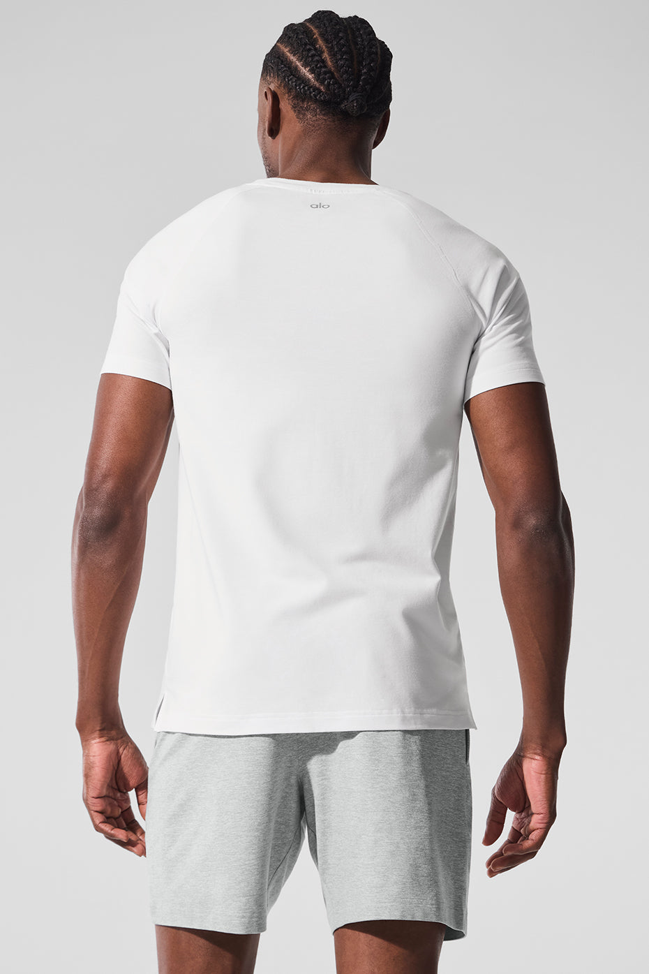 Back view of ALO Vapor Performance Crewneck Tee, perfect for gym sessions and recovery.