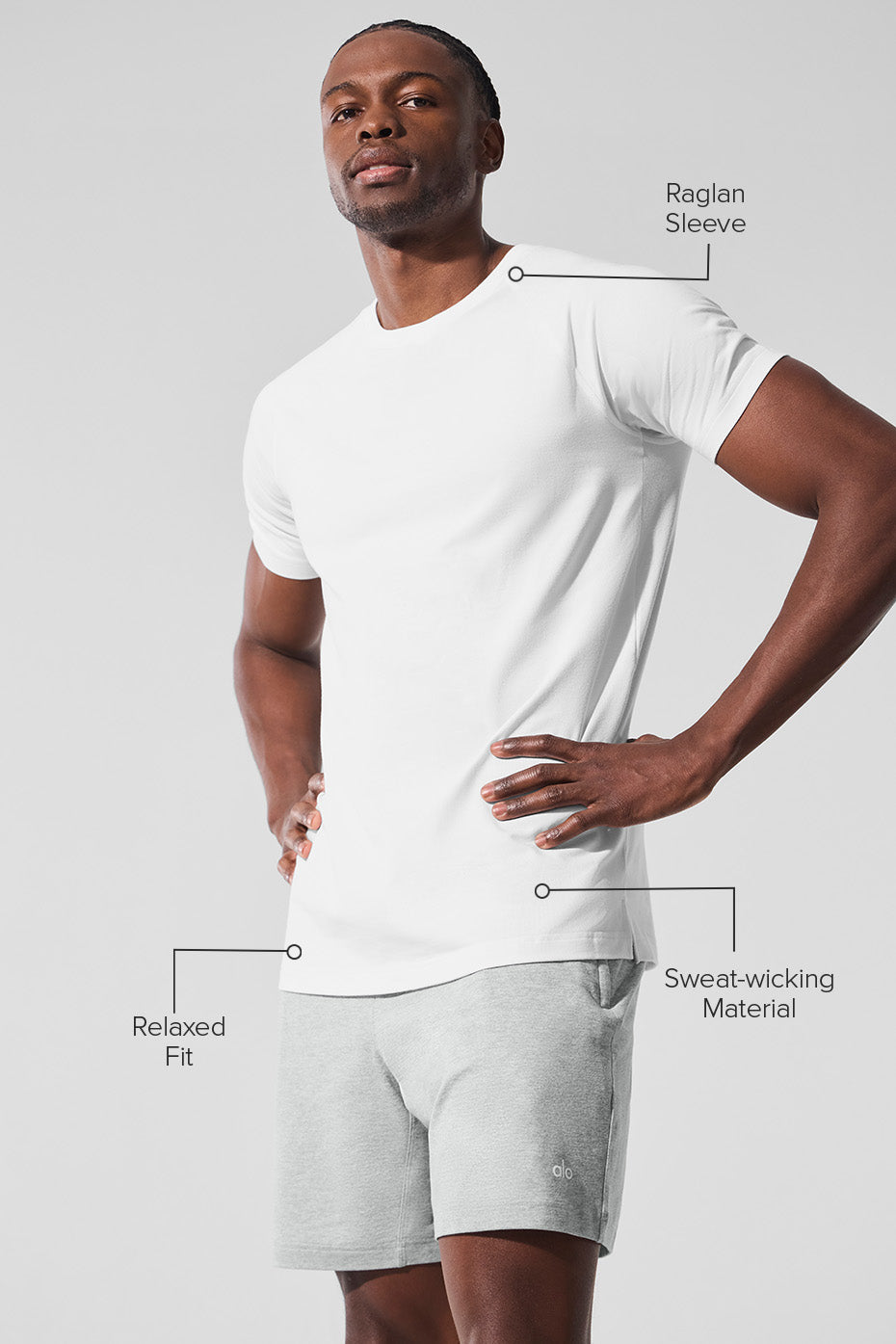 Side view of ALO Vapor Performance Crewneck Tee, highlighting its fit and sweat-wicking fabric.