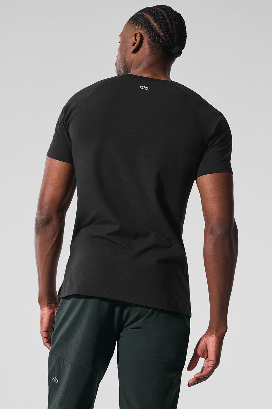 Back view of ALO Vapor Crewneck Tee, perfect for gym sessions and casual outings.