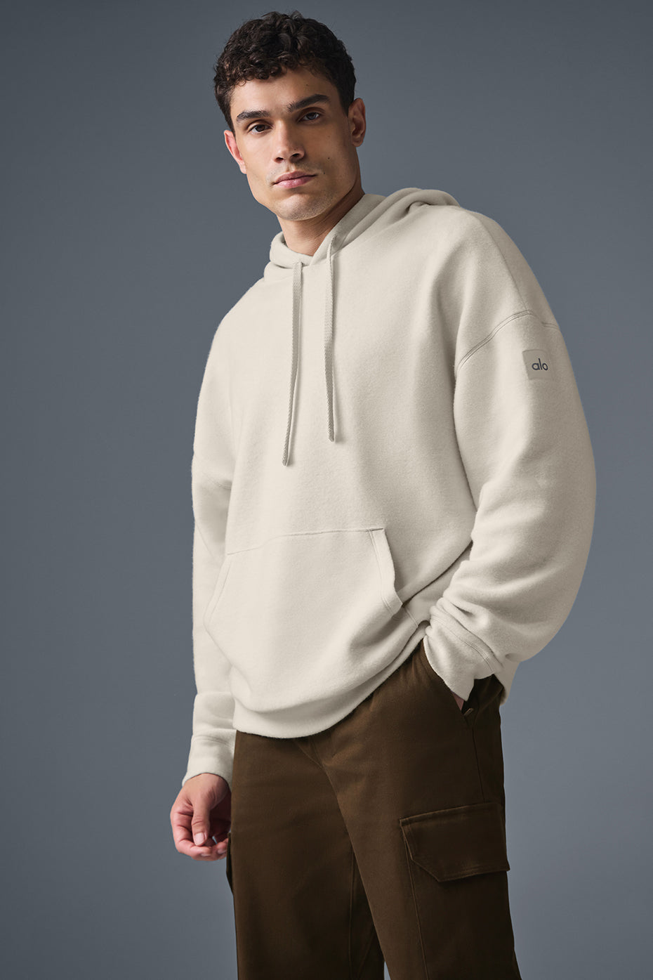 Close-up of the Triumph Comfort Fleece Hoodie in Bone, showcasing the soft texture.