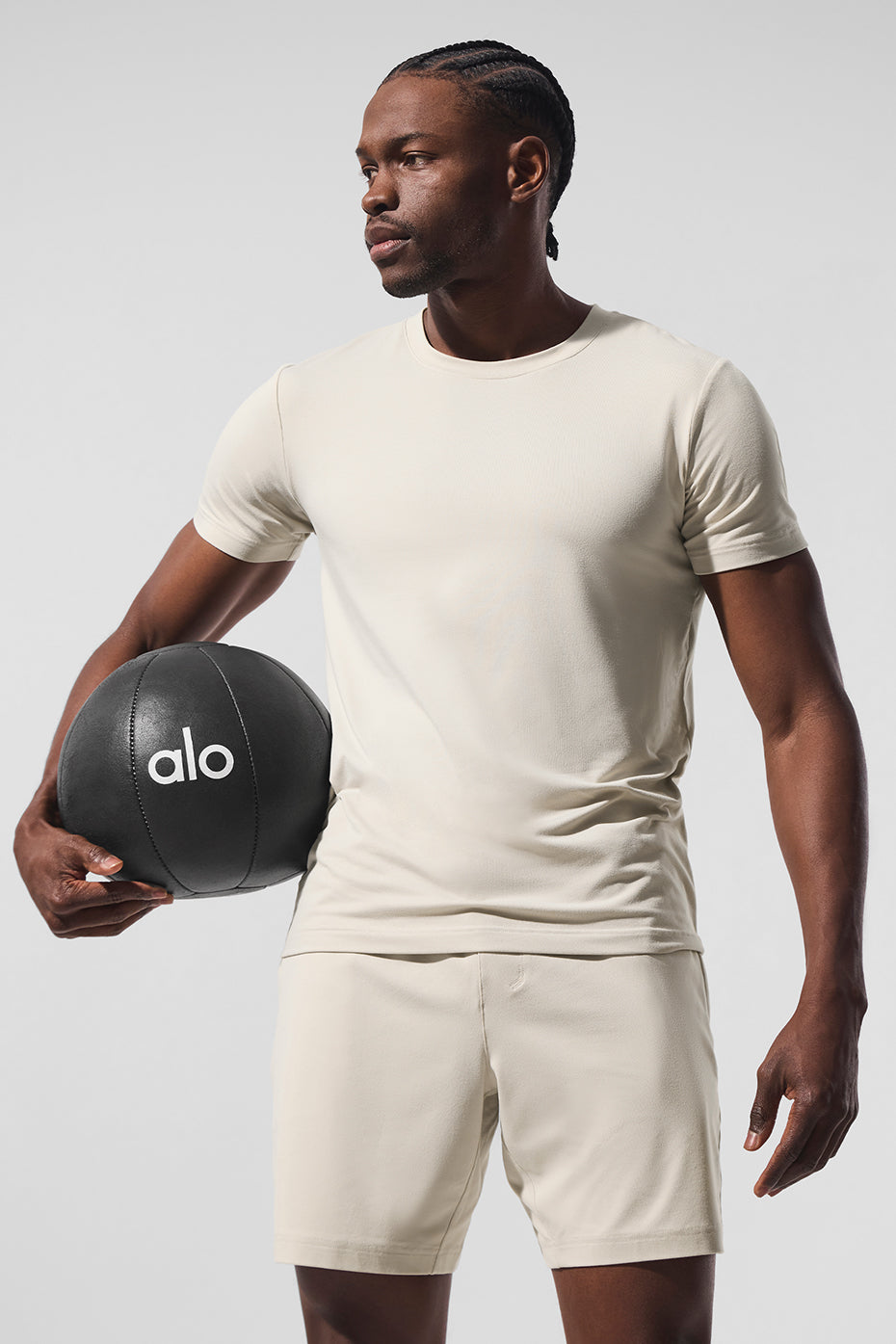 Model wearing the short sleeve sweater top, showcasing its versatility.