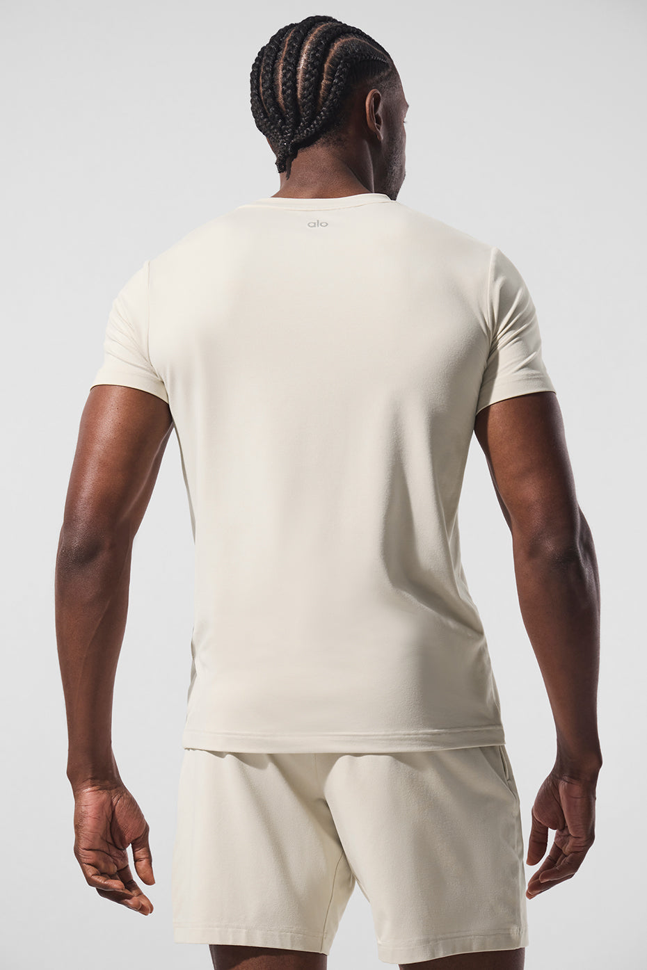 Close-up of the fabric texture of the short sleeve knit top in Bone.