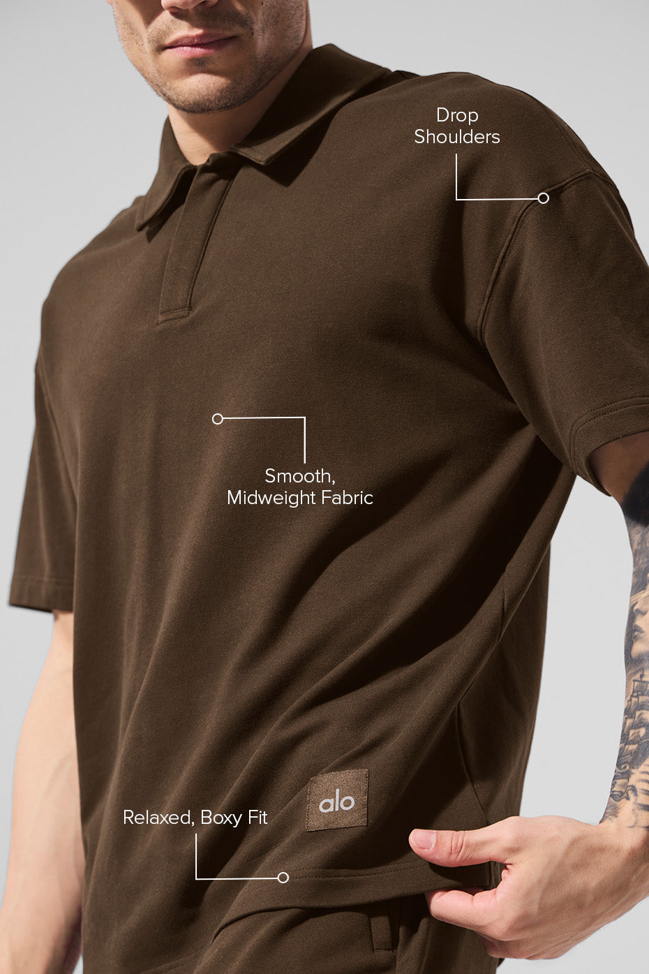 Close-up side view of long sleeve polo shirts for men in natural lighting.