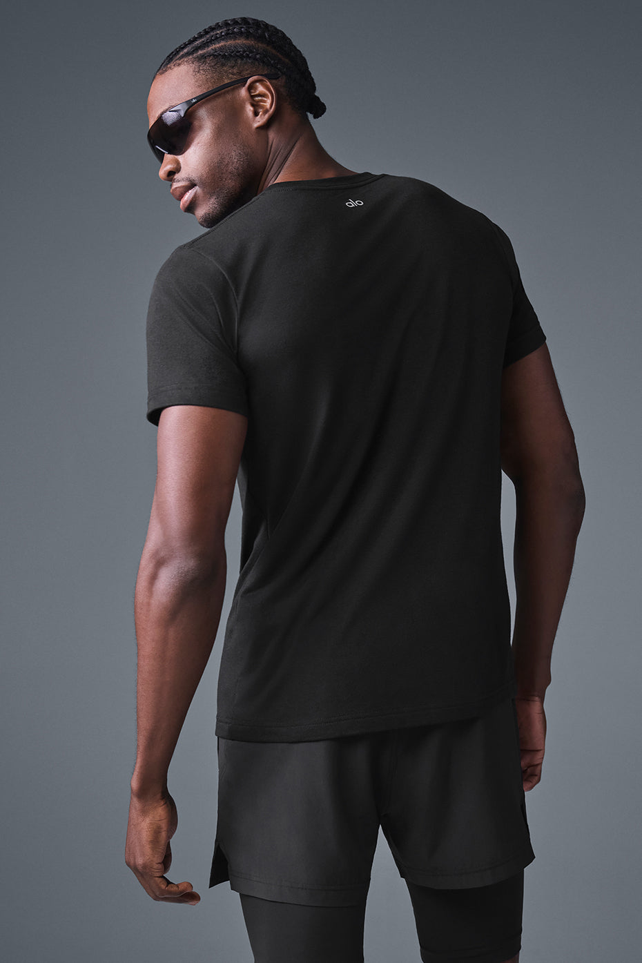 Front view of the Endurance Workout Tee in black, showcasing its relaxed fit.