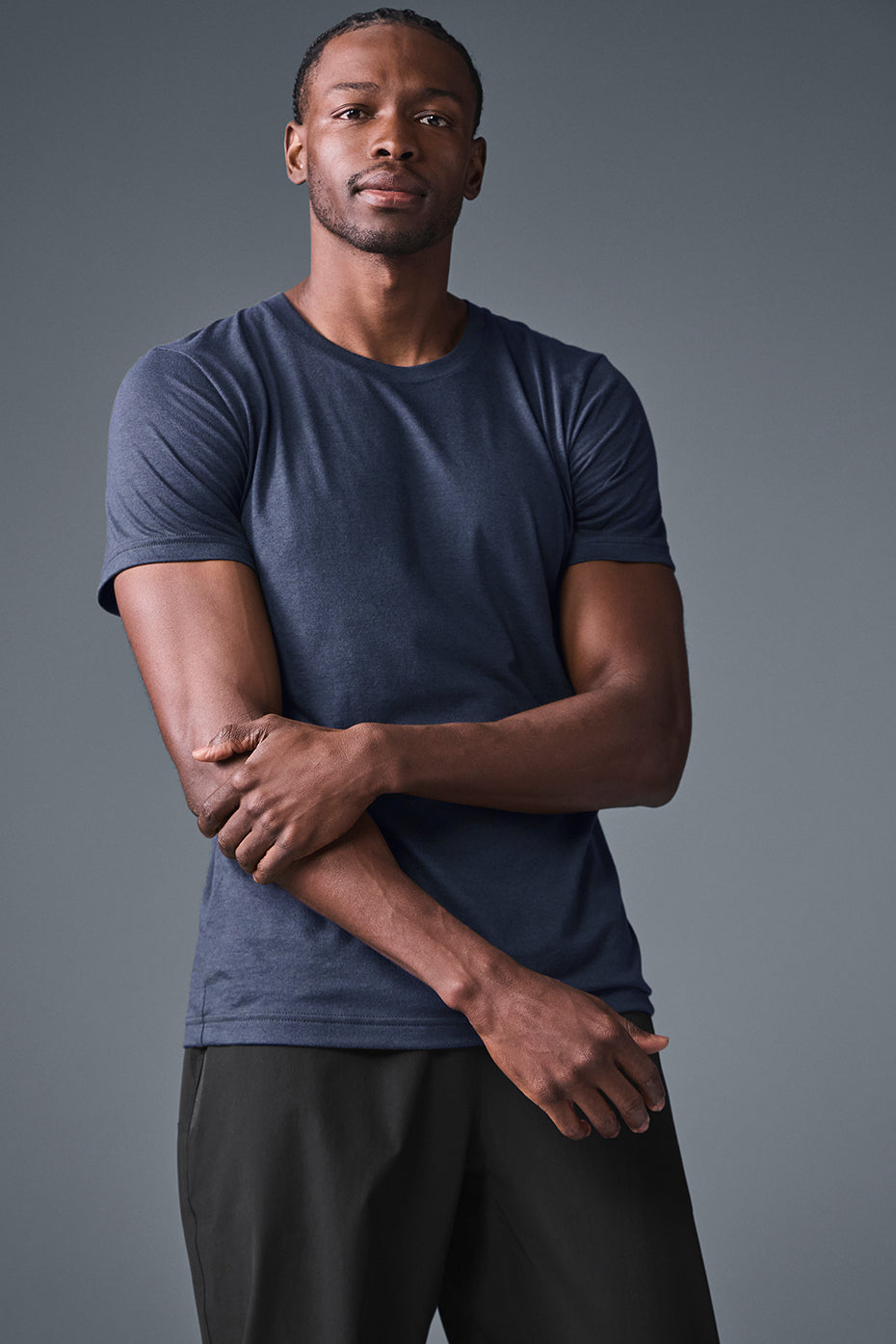 Front view of Triumph Active Tee in navy, ideal for workouts.