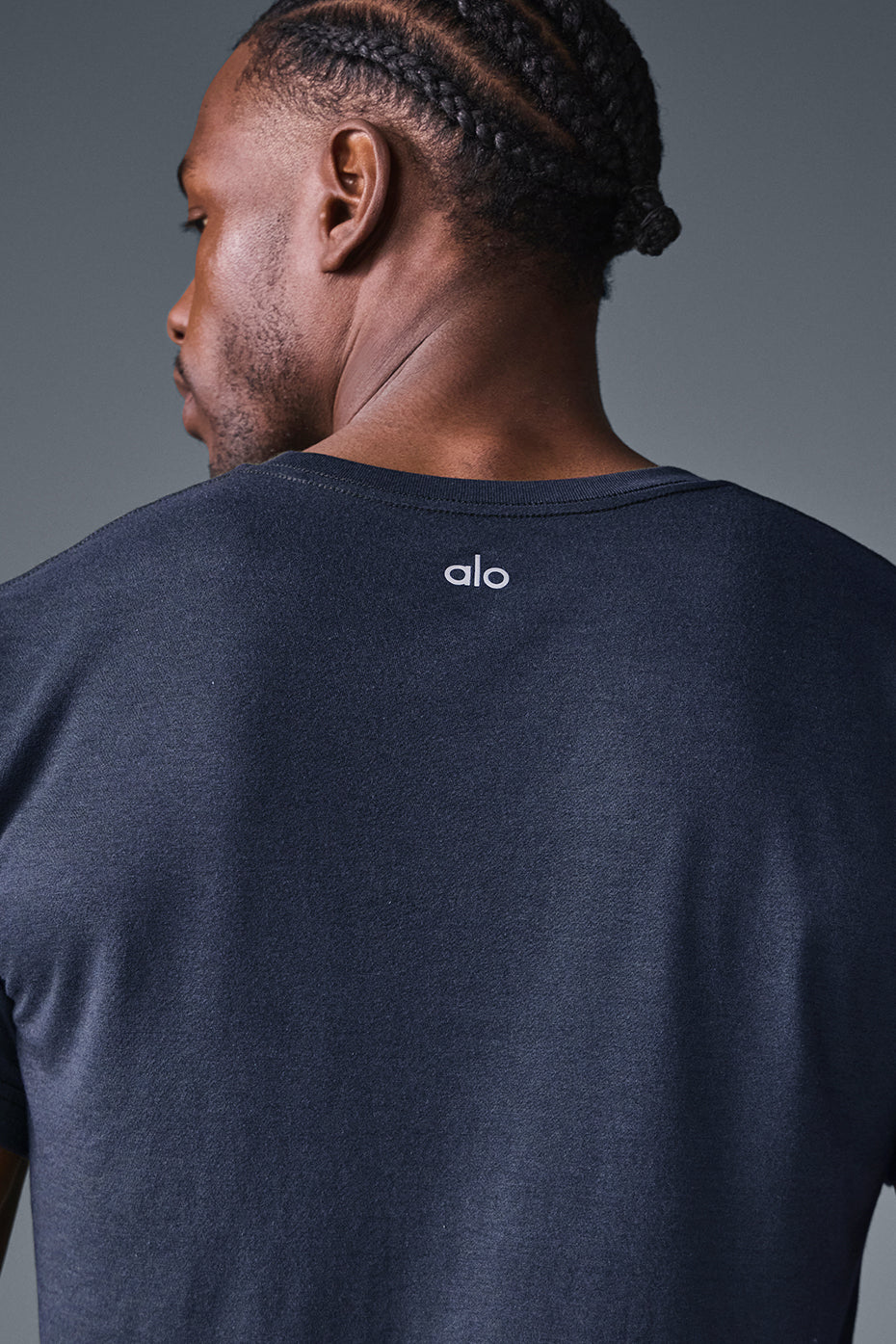 Side view of Triumph Active Tee showcasing its relaxed fit.