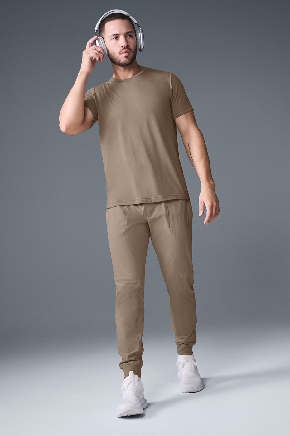 Close-up of the fabric and fit of the Triumph Tee in Gravel color