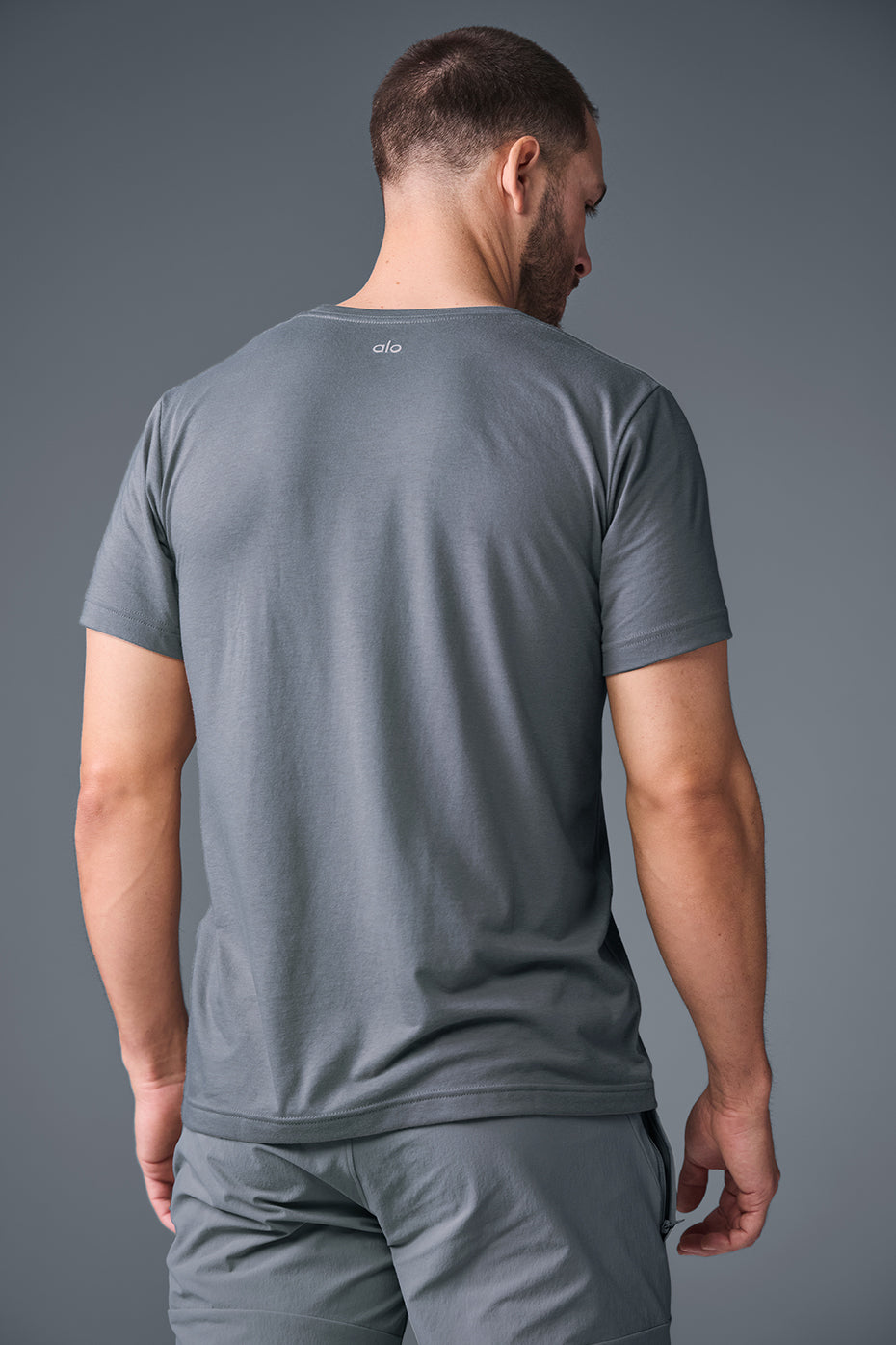 Close-up of the Triumph Performance Tees fabric, ideal for fitness enthusiasts.