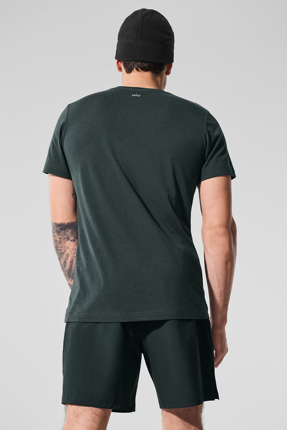 Casual look featuring Timeless Triumph shirt with workout gear, great for everyday wear.