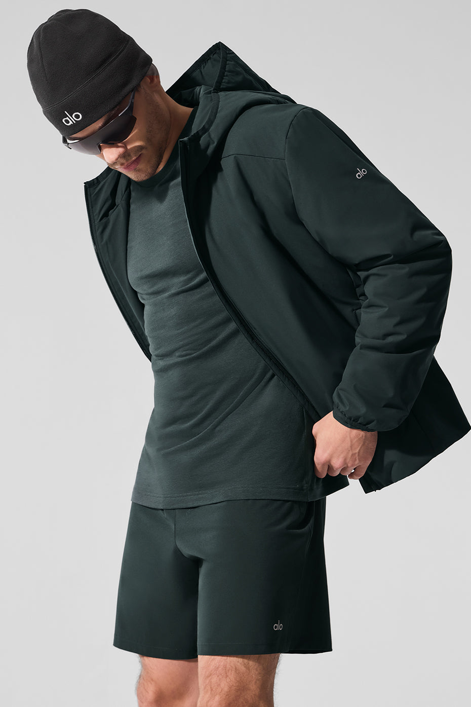 Side view of Charcoal Green fitness t-shirt, showcasing its relaxed fit and style.