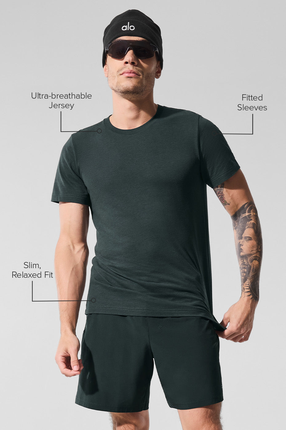 Side view of Charcoal Green fitness t-shirt, showcasing its relaxed fit and style.