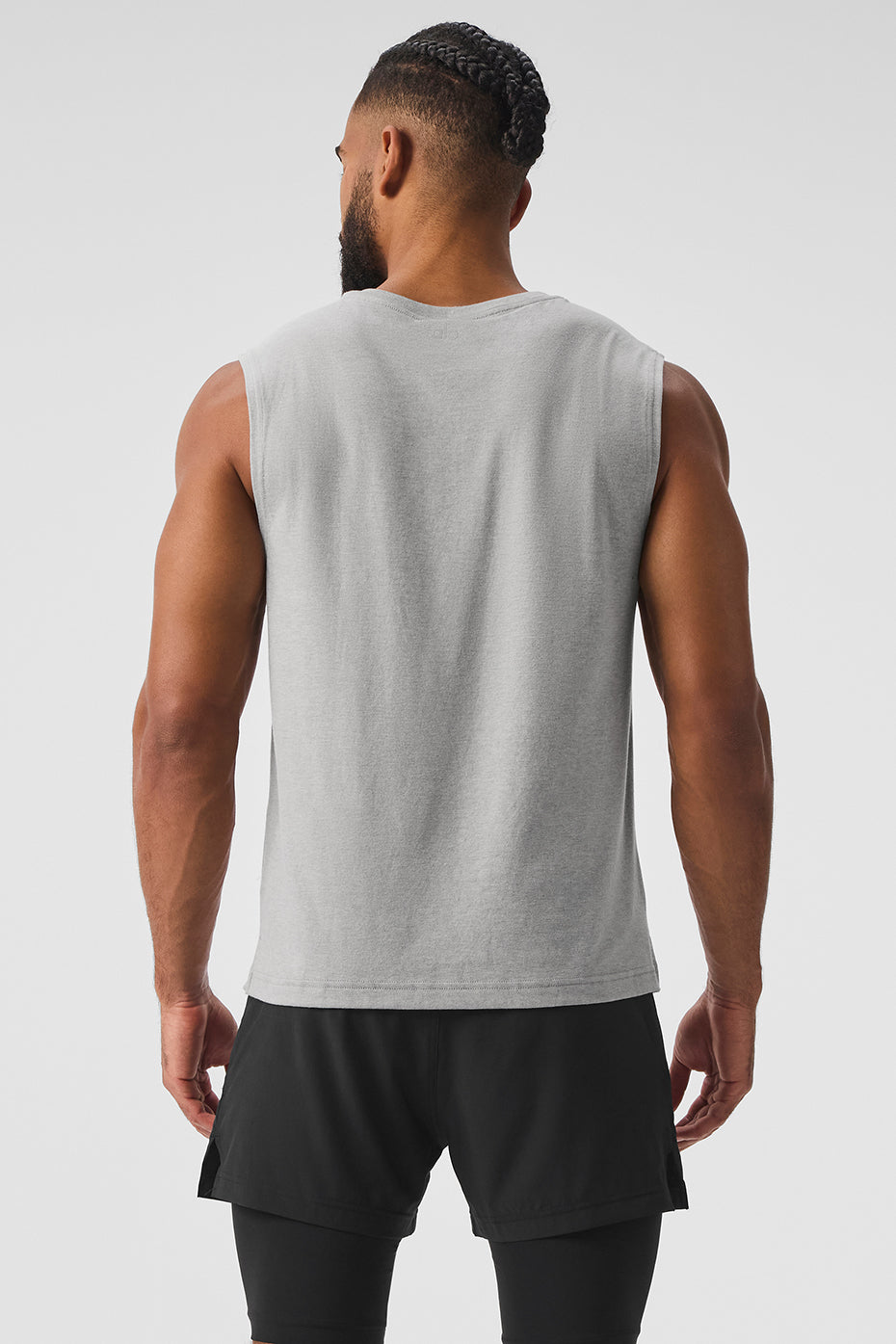 Side profile of ladies muscle tank with dropped armholes for comfort during exercise
