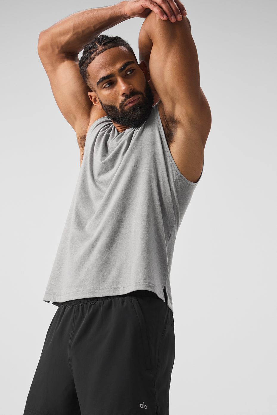 Side profile of ladies muscle tank with dropped armholes for comfort during exercise