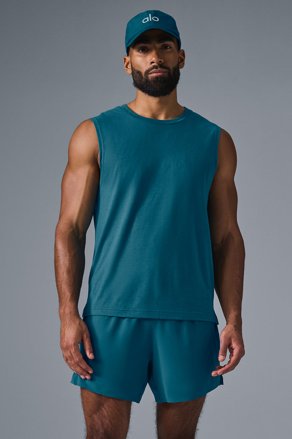 Front view of Oceanic Teal Triumph Muscle Tank, showcasing relaxed fit.